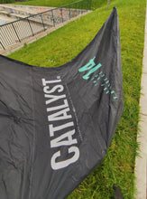 Load image into Gallery viewer,  Used Catalyst V3 14 METERS Ozone kites custom color Black, is the kite for anyone getting into the sport or riders looking for a fun, confidence inspiring kite with ease of use at its heart. Super ligth perfect for light winds and hydrofoil, Friendly price.
