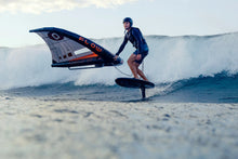 Load image into Gallery viewer, Person riding a surfboard with a wing on a wave, using 'Flow' equipment. ozone Flow v2 branding on a wingfoil portugal
